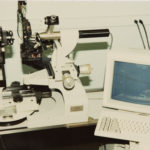 First installation of Optikos knife edge scanning MTF system on to Mann bench system at Polaroid for testing photographic lenses - 1986