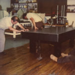 Setting up a floating table on the uneven floors at Cardinal Medeiros Avenue