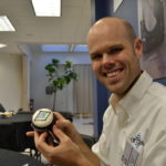 Haskell appreciates the cupcakes at NES/OSA mtg., May, 2015