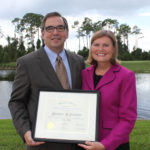 Steve and Betsy Fantone, with OSA award named in honor of Stephen D. Fantone, Oct. 2013 