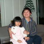 Jian Zhang and daughter at holiday party - 1999